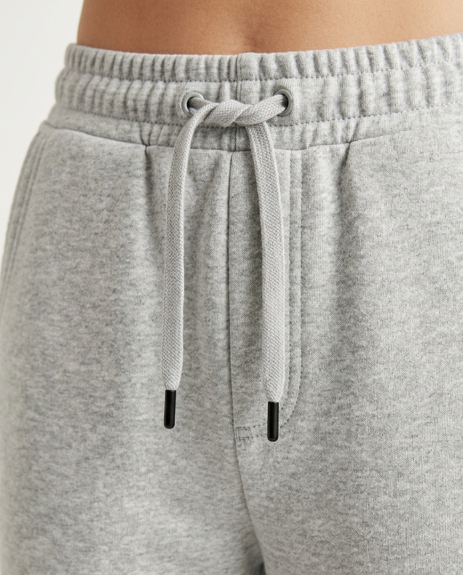 ZIL light gray wide leg pants, close up of the elasticated waistband and flat drawcord