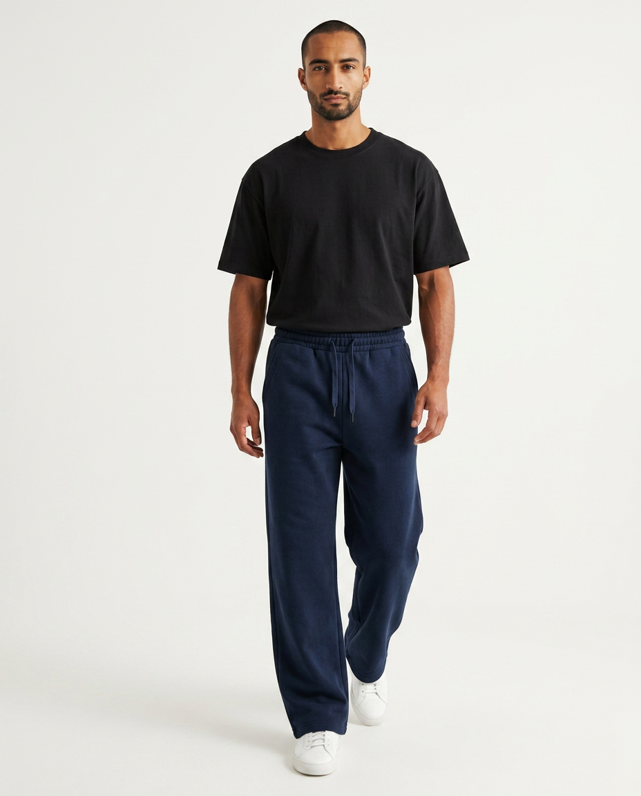 ZIL navy blue wide leg pants, walking three-quarter view showing the wide leg drape