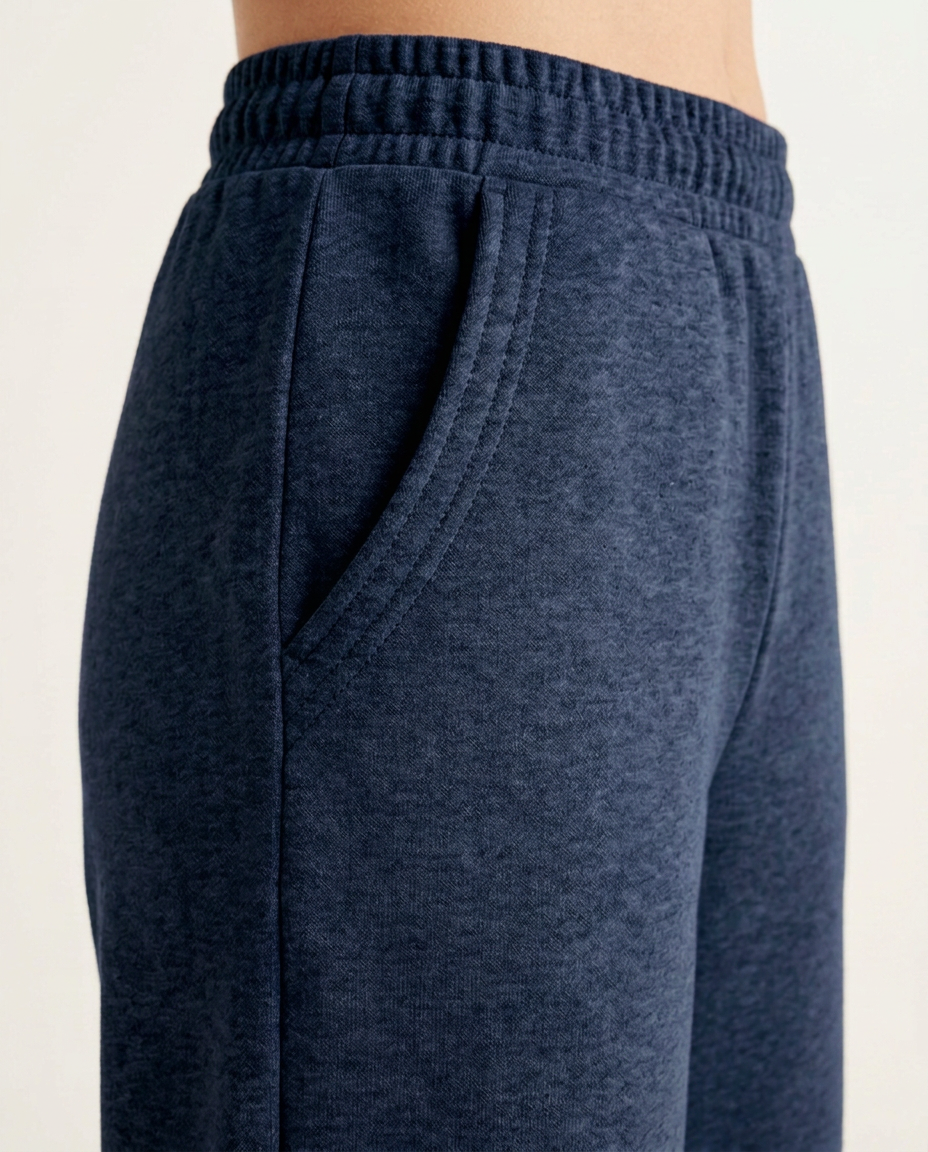 ZIL navy blue wide leg pants, close up of the slanted front pocket with three rows of topstitching
